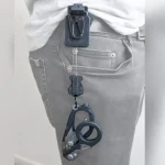 Porta tijera con cuerda metálica retráctil